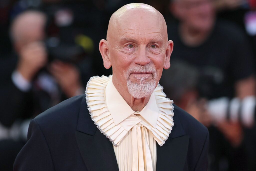 John Malkovich Fights Back Tears During 13-Minute Standing Ovation for “Wild Horse Nine” at Venice