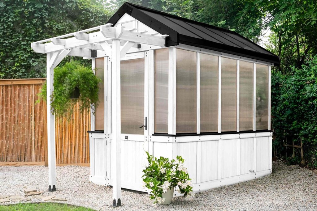 Amazon Has a Cottage-Style Greenhouse with a Workstation, Temperature-Activated Fan, and USB Ports — for Under $3.5K