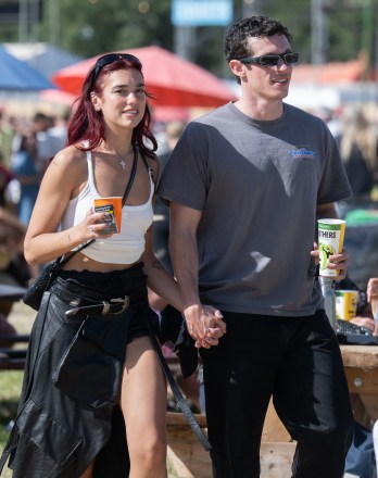 Dua Lipa & Callum Turner: Pics of the Couple day four of Glastonbury Festival 2024 at Worthy Farm, Pilton on June 29, 2024 in Glastonbury, England.