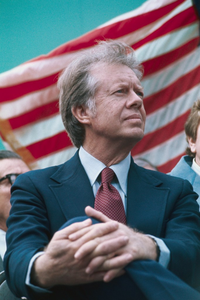 (Original Caption) Columbia, S.C.: Democratic candidate Jimmy Carter is in a serious mood as he waits to speak during rally recently in his campaign for the presidency. On the eve of the national elections pollsters across the country are predicting a very tight race between Carter and incumbent Gerald Ford.