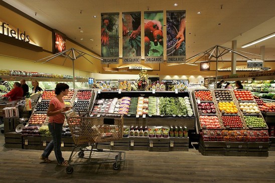 LIVERMORE, CA - JULY 18: A Safeway customer browses in the fruit and vegetable section at Safeway's new "Lifestyle" store July 18, 2007 in Livermore, California. Safeway unveiled its newest Lifestyle store that features numerous organic and natural foods as well as expanded produce, meat, seafood and floral departments. The store also offers freshly made desserts and baked goods, a coffee roaster, a fresh nut bar and wine section with over 2,000 wines, some of which are stored in a climate controlled wine cellar. (Photo by Justin Sullivan/Getty Images)