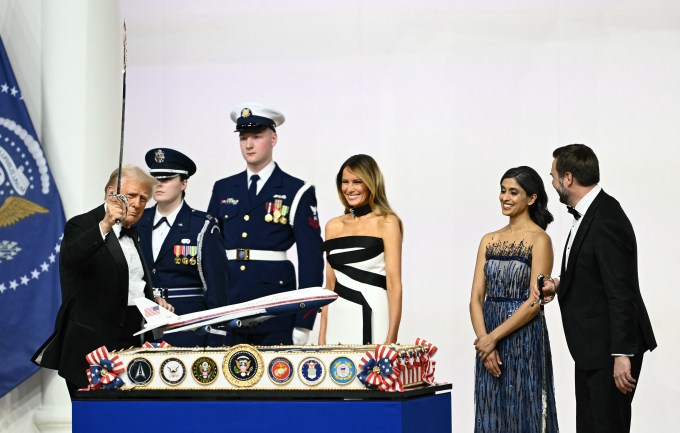 Melania, J.D., Usha & Donald With an Air Force One Cake