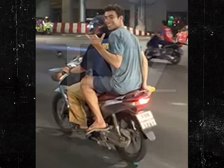 Luigi Mangione On Motorcycle