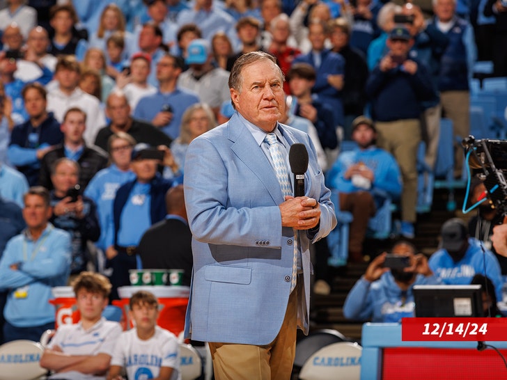 North Carolina Tar Heels football head coach Bill Belichick speaks to the crowd