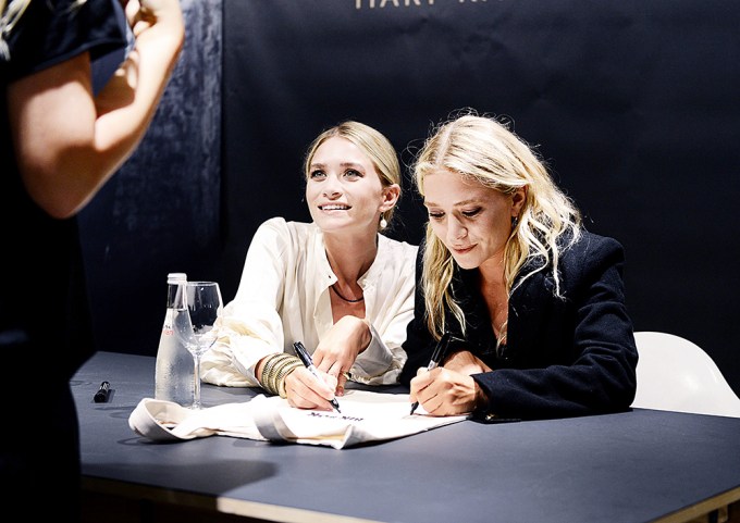 Mary-Kate and Ashley Olsen At A Signing