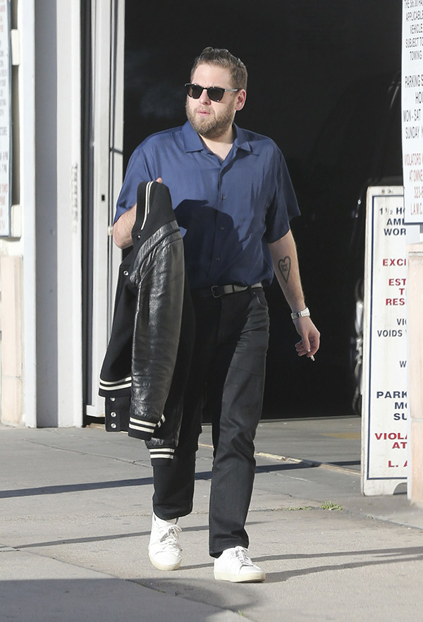Jonah Hill Carries a Coat in 2017