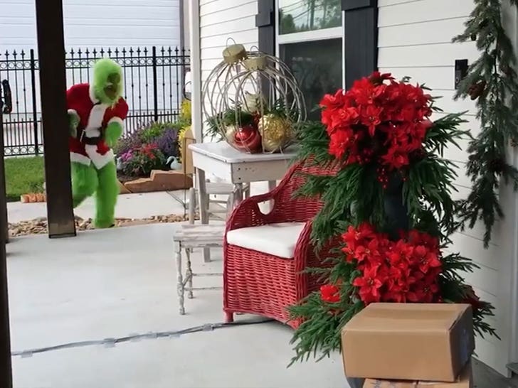 Man in Grinch costume approaches porch packages in Texas police PSA video