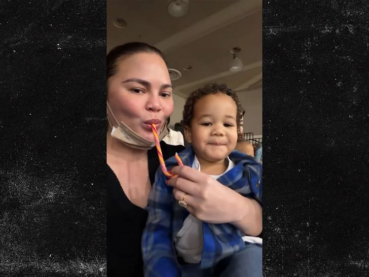 122225_chrissy_tiegen_candy_cane