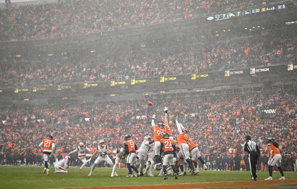 DENVER , CO - JANUARY 25:  Andy Borregales (36) of the New England Patriots makes a 10-7 field goal as the Denver Broncos attempt to block it during the third quarter at Empower Field at Mile High in Denver, Colorado on Sunday, January 25, 2026. (Photo by AAron Ontiveroz/The Denver Post)