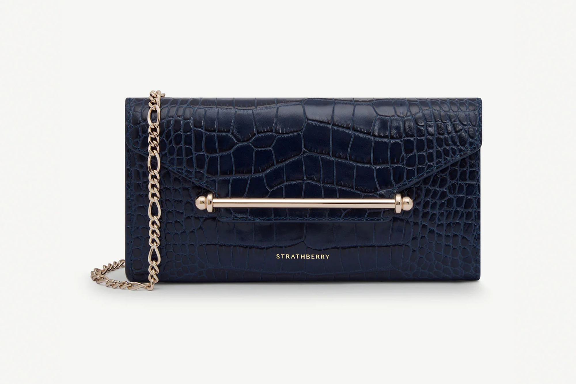 Strathberry dark blue crocodile embossed leather wallet with gold chain strap and gold bar closure.