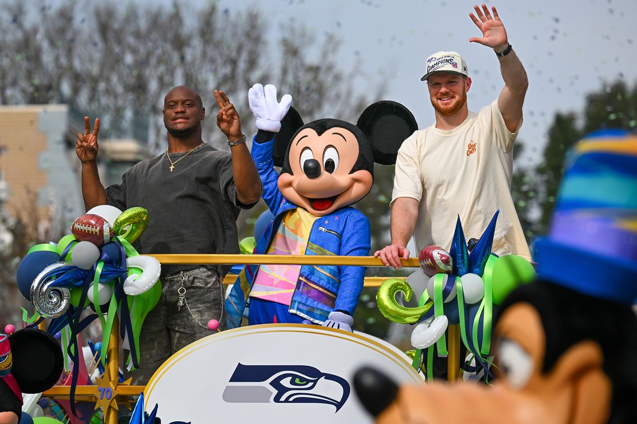 Kenneth Walker III and Sam Darnold at Disneyland on Feb. 9 Jeff Gritchen, Orange County Register/SCNG