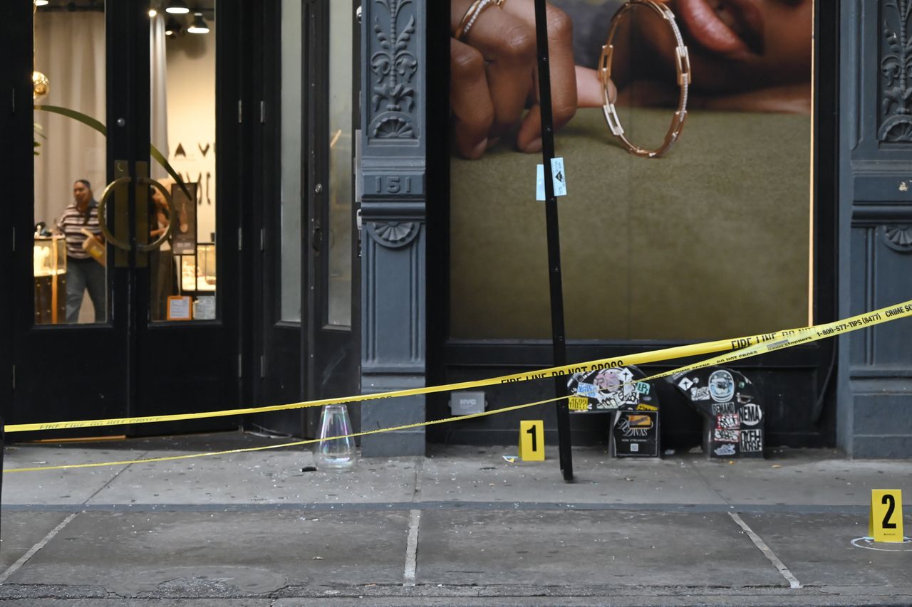 Members of the NYPD Crime Scene Unit investigate the scene where merchandise valued at over $1 million is taken from 4Gseller at 151 Spring Street in SoHo Members of the NYPD Crime Scene Unit investigate the scene where merchandise valued at over $1 million is taken from 4Gseller at 151 Spring Street in SoHo Kyle Mazza/NurPhoto/Shutterstock