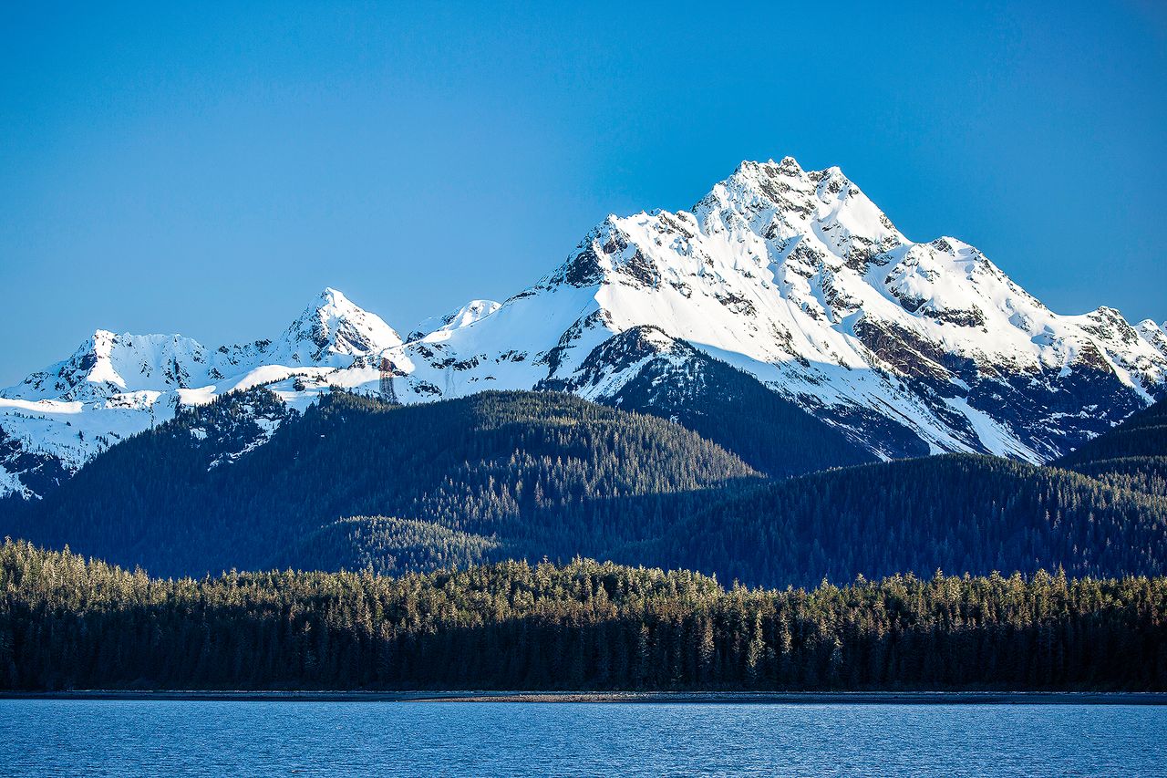 Snow-capped mountains in Alaska Getty