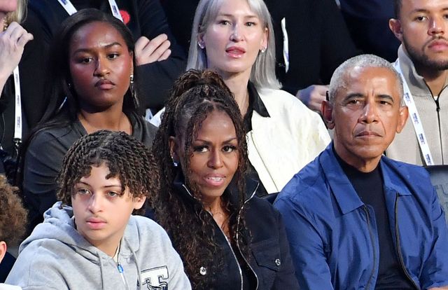 Sasha, Barack and Michelle Obama at the 2026 NBA All-Star Game on Feb. 15 by Allen Berezovsky/Getty