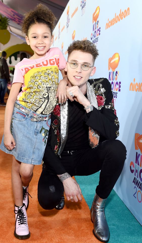 Recording artist Machine Gun Kelly (R) and Casie Colson Baker at Nickelodeon's 2017 Kids' Choice Awards at USC Galen Center on March 11, 2017 in Los Angeles, California. Machine Gun Kelly and Casie Colson Baker in 2017 Emma McIntyre/Getty