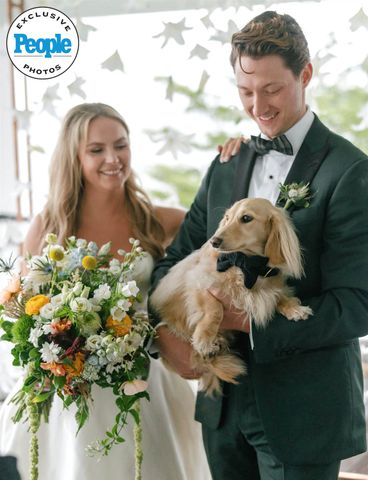 Dog Has Adorable Reaction to Owners Getting Married Hannah Duane Schott , Tyler Joseph Schott and Gus Hannah Duane Schott and Tyler Joseph Schott with their pet dog, Gus James Anderson Photography