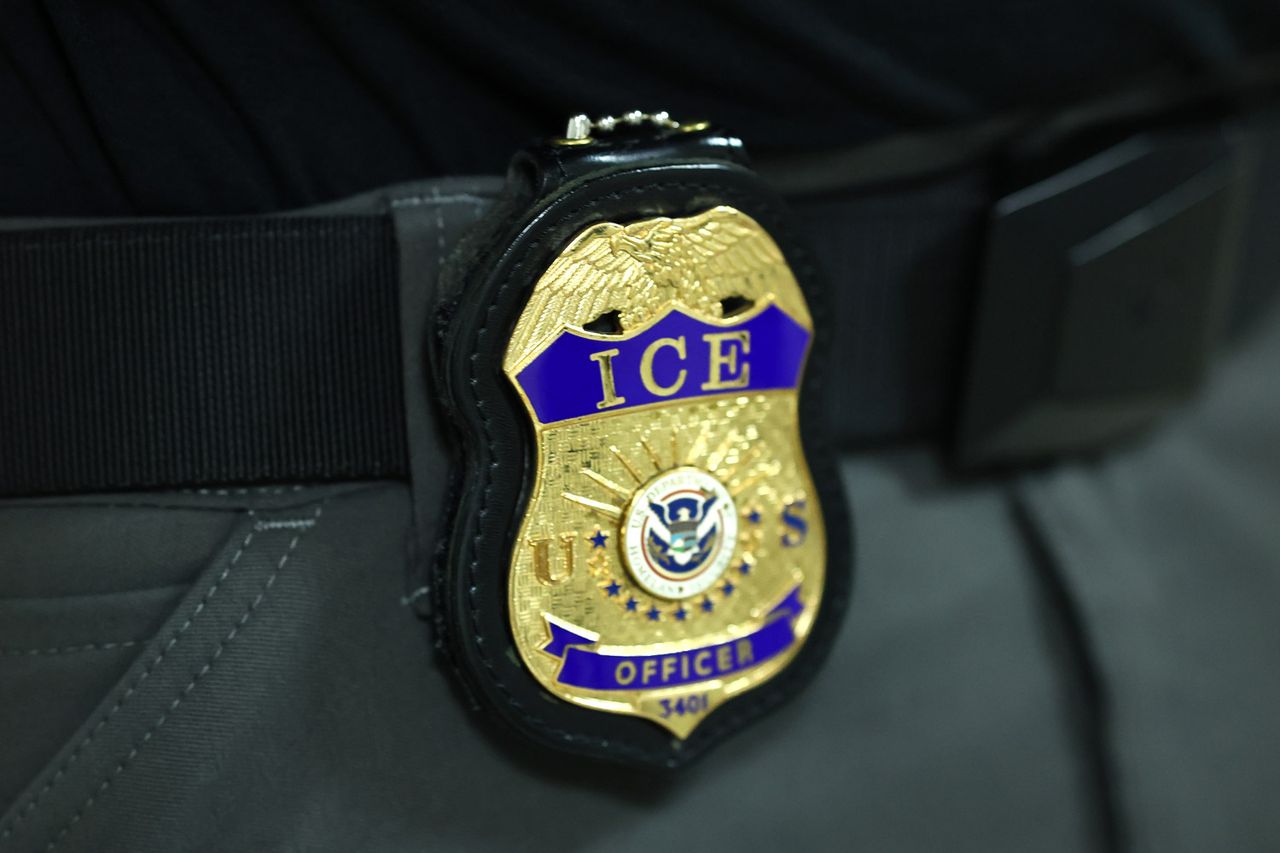 The badge of an Immigration and Customs Enforcement ICE agent is seen as they patrol the halls of immigration court at the Jacob K. Javitz Federal Building on June 09, 2025 in New York City. Immigration and Customs Enforcement (ICE) agent badge Michael M. Santiago/Getty