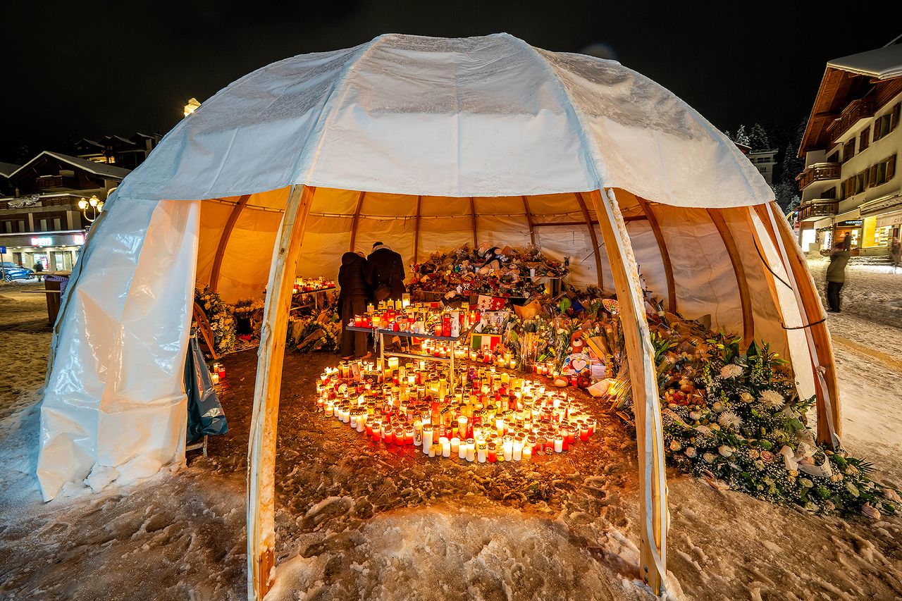 Memorial for the 41 people who died in New Year's fire in Switzerland MAXIME SCHMID / AFP via Getty