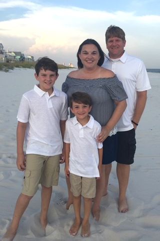 Amy Wade with her husband and two sons Amy Wade