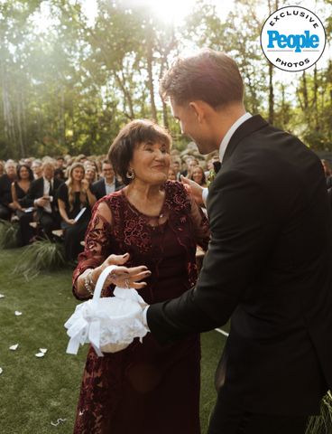 Nick Steinmetz hugging his maternal grandmother, Loretta Simple Escape