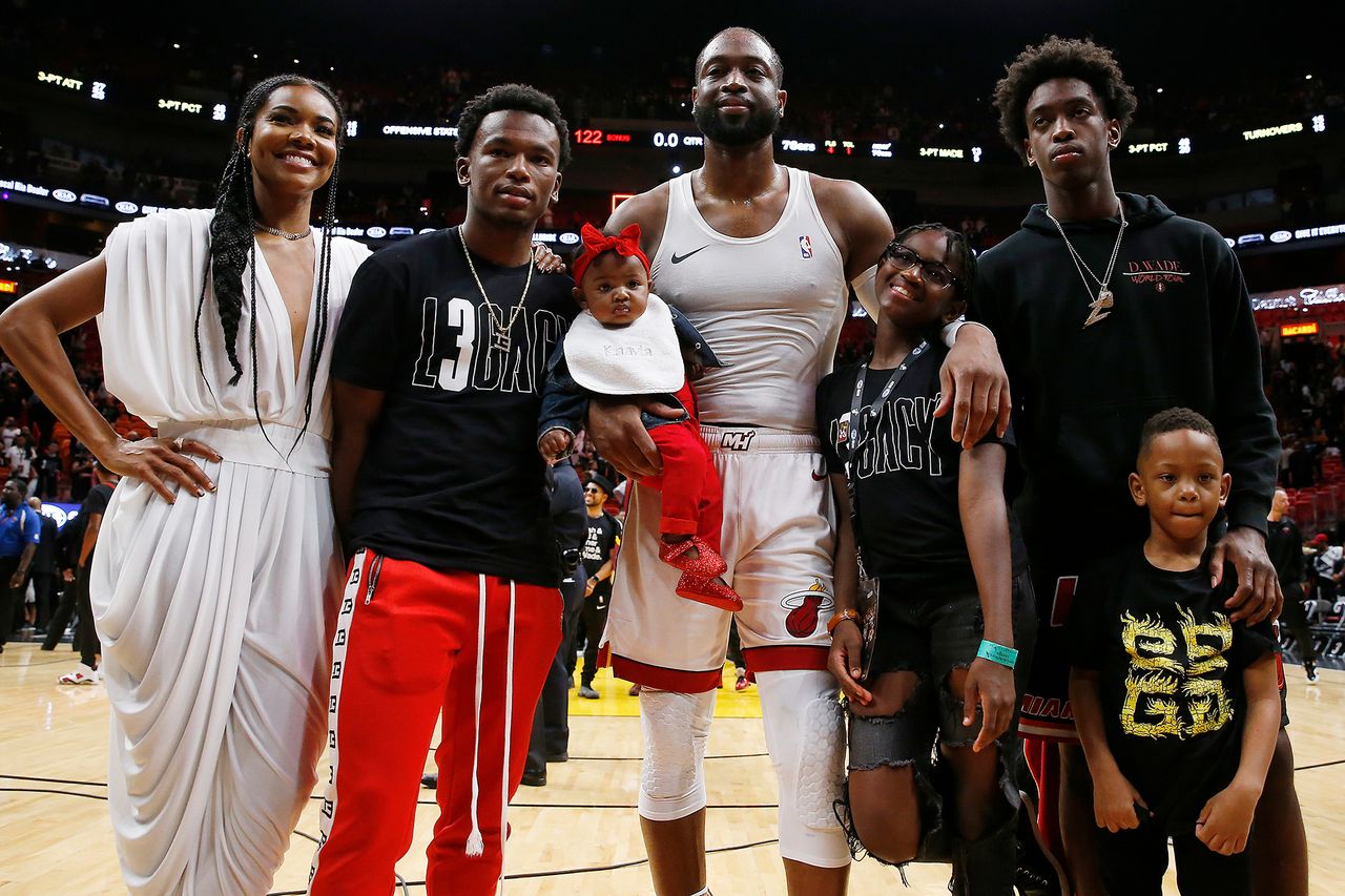 Gabrielle Union and Dwyane Wade with their kids and nephew in 2019 Michael Reaves/Getty Images