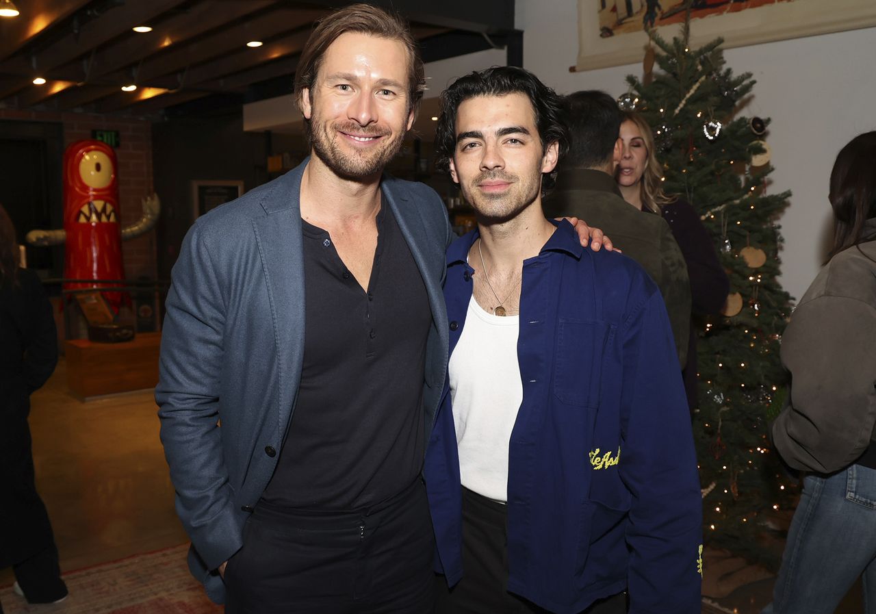 Glen Powell Joe Jonas Glen Powell and Joe Jonas at a 'Devotion' screening in Santa Monica, Calif., on Dec. 12, 2022 Phillip Faraone/Getty
