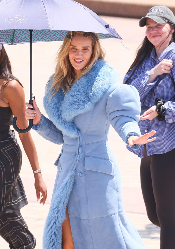Rosie Huntington-Whiteley strikes a pose during a stylish photoshoot in Sydney at the Opera House. Rosie Huntington-Whiteley KHAP / BACKGRID