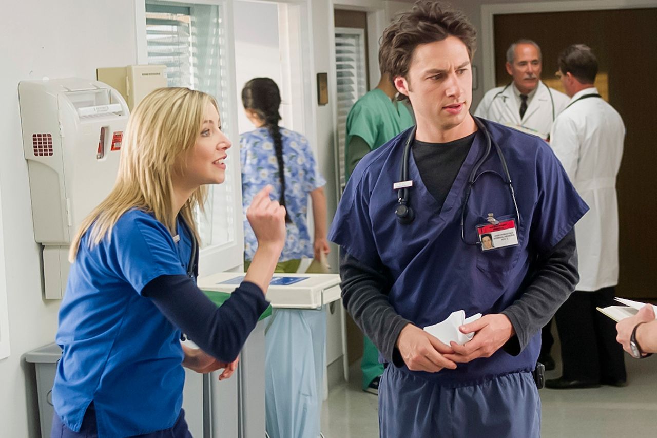 Zach Braff and Sarah Chalke in a hospital setting performing a scene from a TV series Sarah Chalke and Zach Braff on 'Scrubs'Credit: Paul Drinkwater/NBCU Photo Bank/NBCUniversal via Getty