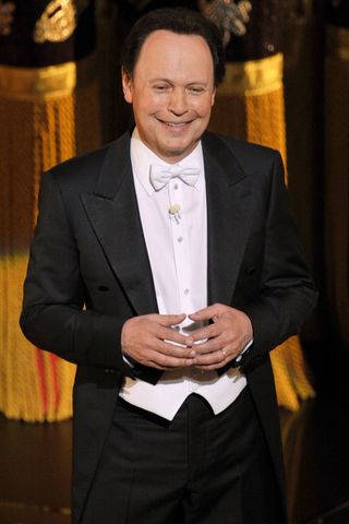 Host Billy Crystal performs onstage during the 84th Annual Academy Awards held at the Hollywood & Highland Center on February 26, 2012 in Hollywood, California. Billy Crystal in 2012Credit: Kevin Winter/Getty