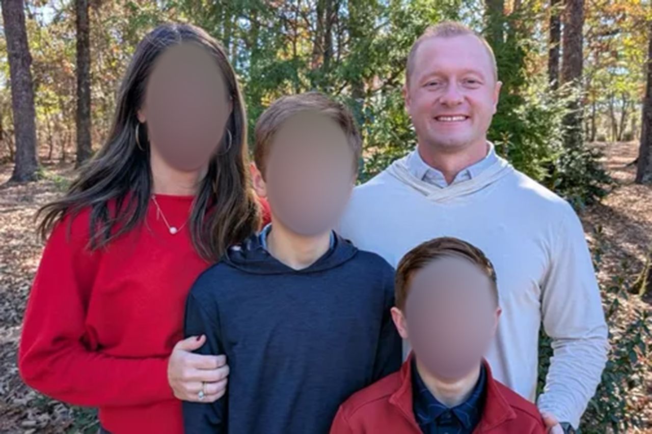 Jason Hughes (right) with his wife Laura Hughes (left) and their two sonsCredit: gofundme