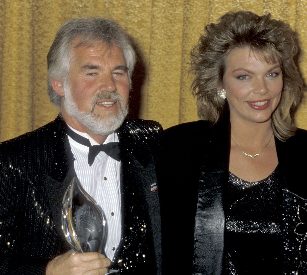 Musician Kenny Rogers and daughter Carole Rogers attend the 12th Annual People's Choice Awards on March 11, 1986 at Santa Monica Civic Auditorium in Santa Monica, California. Kenny Rogers and daughter Carole Rogers attend the 12th People's Choice Awards at Santa Monica Civic Auditorium in Santa Monica, Calif., on March 11, 1986Credit: Ron Galella/Ron Galella Collection via Getty
