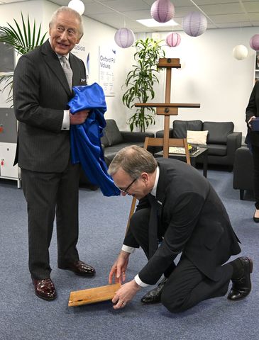 King Charles knocked over a plaque at the Oxford Photovoltaics headquartersCredit: Kate Green/Getty