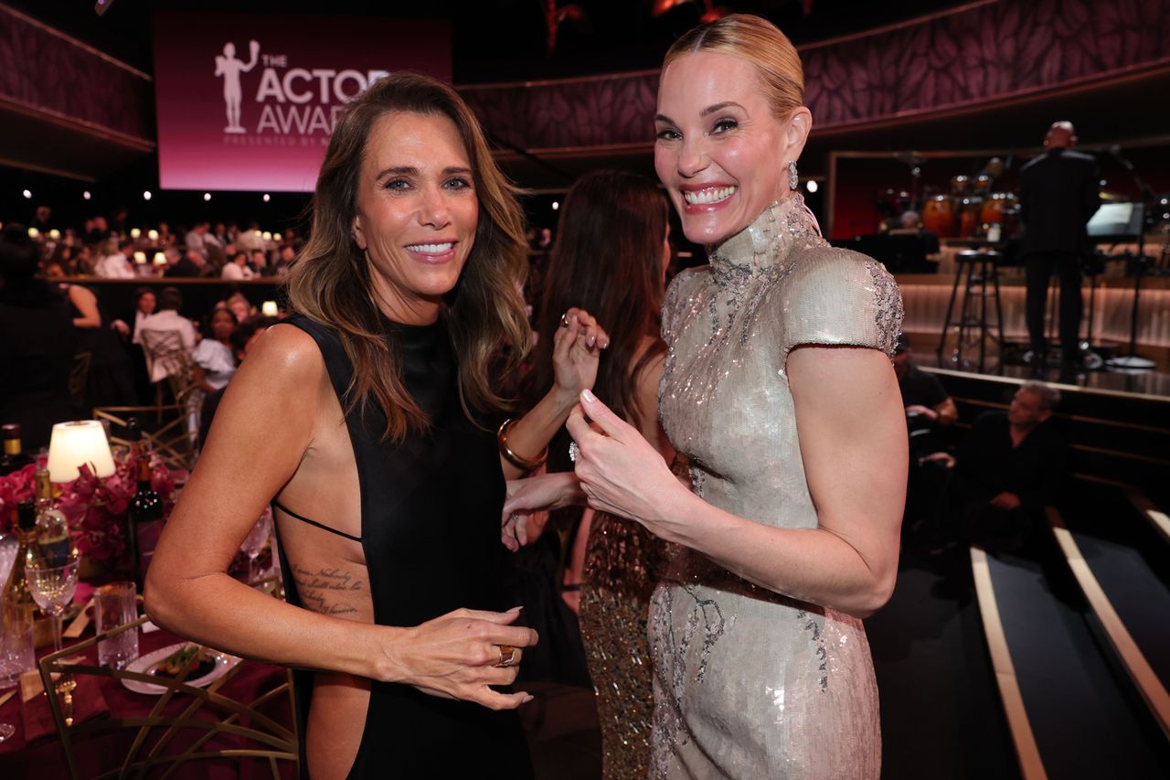 Kristen Wiig and Leslie Bibb Kristen Wiig and Leslie BibbCredit: Christopher Polk/Shutterstock