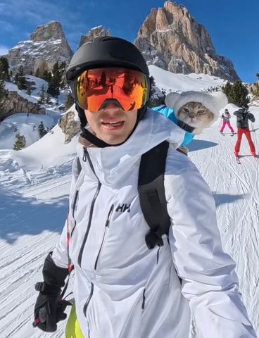 Lazar Joksimovic skiing with his catCredit: courtesy Lazar Joksimovic/@louieandtodd
