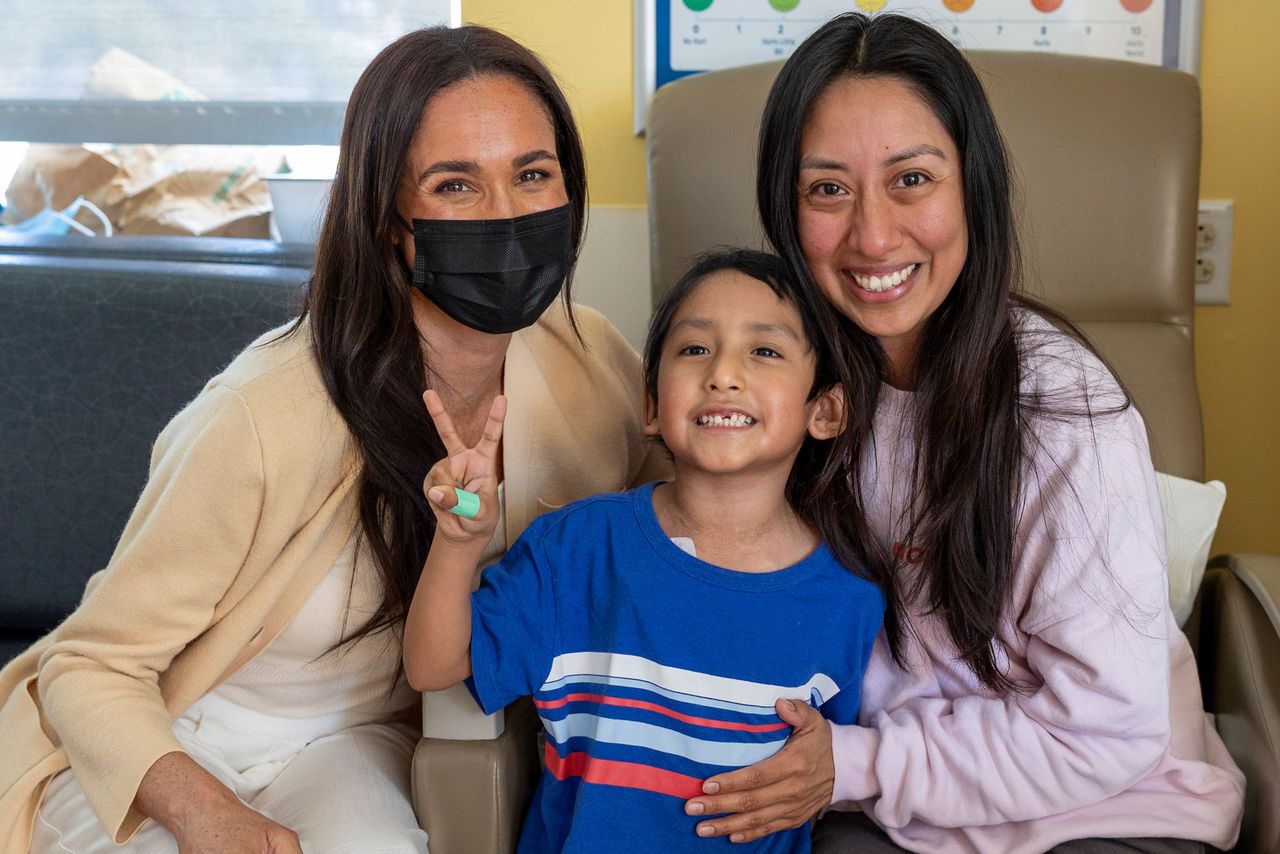 Meghan Markle smiles with a patient at Children's Hospital Los AngelesCredit: CHLA