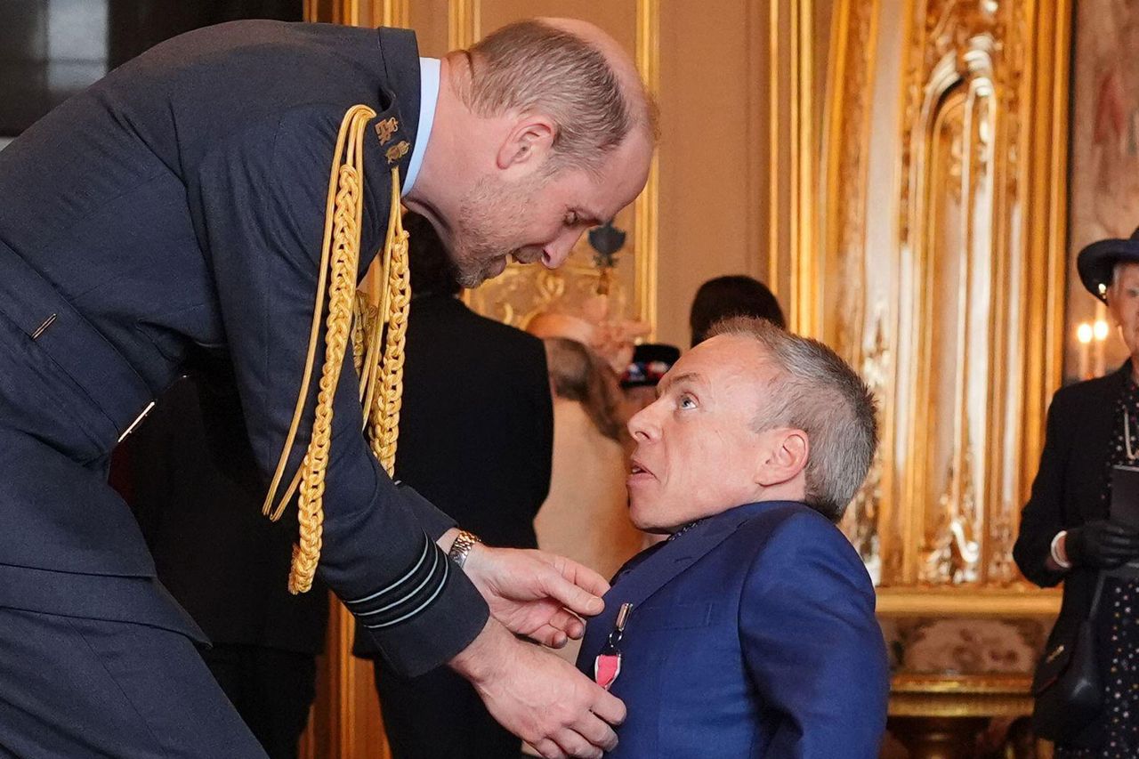 Warwick Davis (right) shakes hands with Prince William on March 11Credit: alamy/PA Images