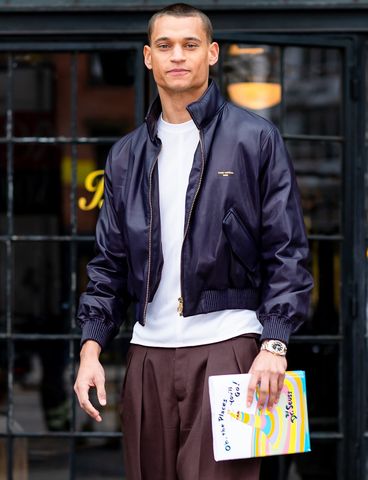 Tyriq Withers was spotted filming an interview in New York City while holding the Dr. Seuss book Oh The Places You'll GO Tyriq WithersCredit: The Hapa Blonde / BACKGRID