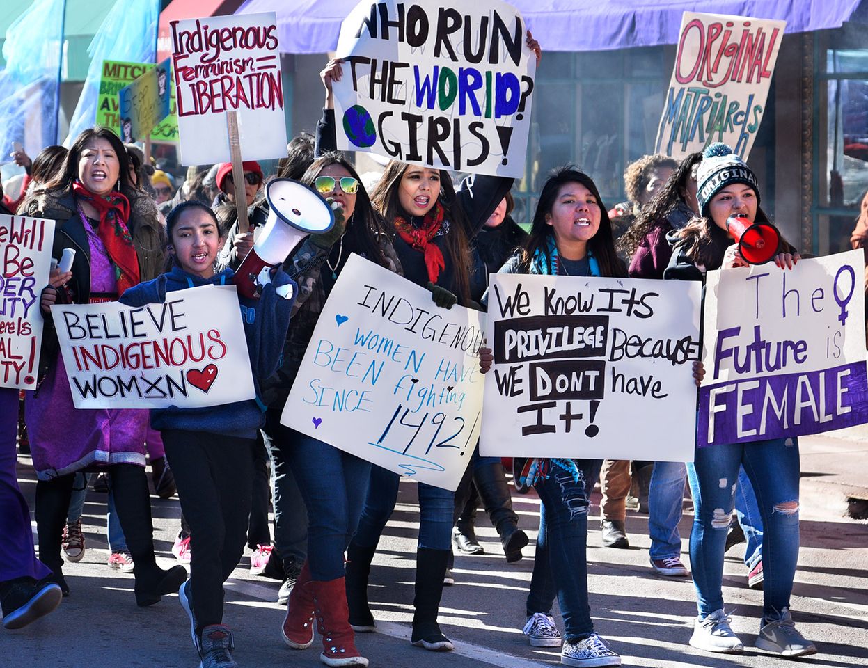 Native American participants walk with signs and bullhorns during the Women's March in Santa Fe, N.M., on Jan. 19, 2019Credit: Robert Alexander/Getty Images