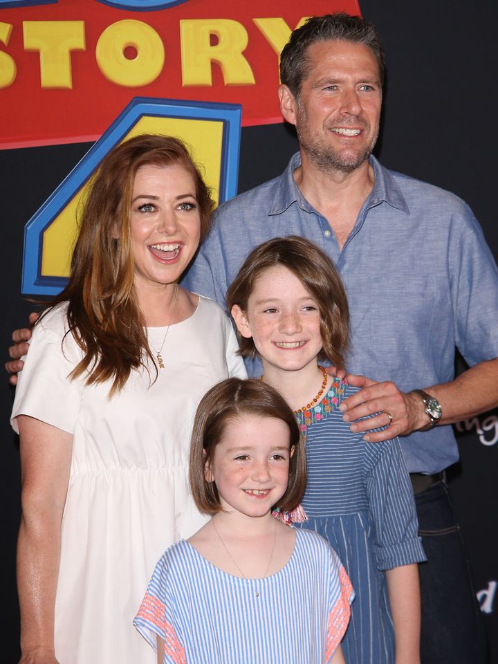 Alyson Hannigan and Alexis Denisof with their kids, Satyana and Keeva, at the Los Angeles premiere of 'Toy Story 4' Alexis Denisof and Alyson Hannigan with daughters Satyana Marie and Keeva Jane DenisofCredit: Michael Tran/FilmMagic
