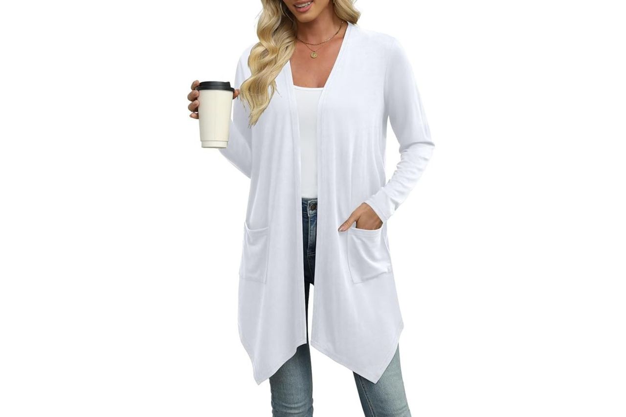 A person wearing a long openfront cardigan holding a cup Credit: Amazon