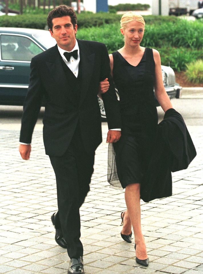 John F. Kennedy Jr. and Carolyn Bessette at a receptionCredit: Brooks Kraft LLC/Sygma via Getty