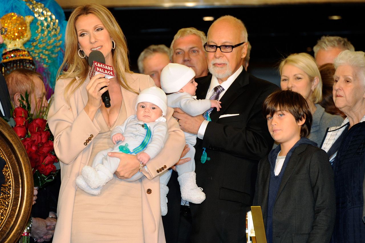 Singer Celine Dion, holding her son Nelson Angelil, her husband and manager Rene Angelil, holding their son Eddy Angelil, and their son Rene-Charles Angelil are greeted as they arrive at Caesars Palace February 16, 2011 in Las Vegas, Nevada. Credit: Ethan Miller/Getty