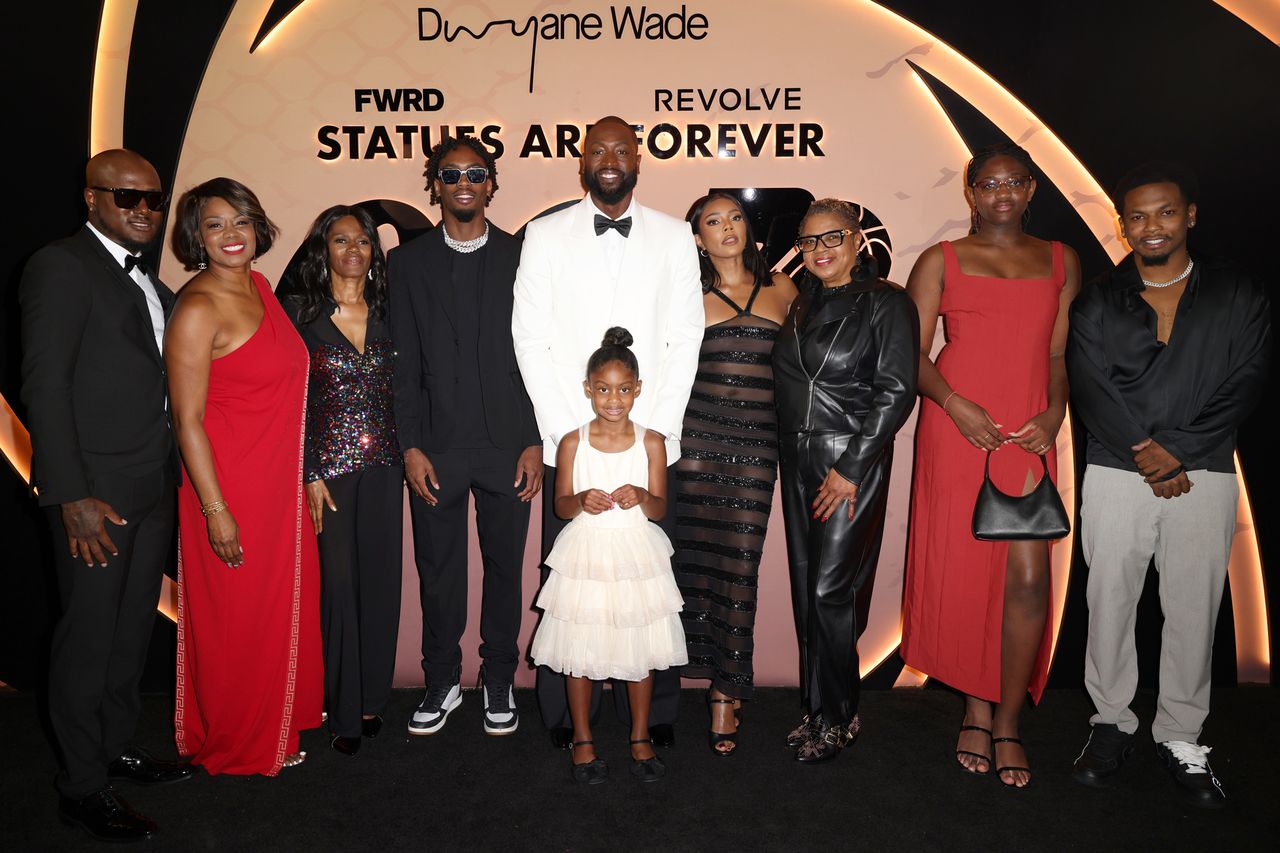 Dwyane Wade and his wife, Gabrielle Union, with their family in October 2024.Credit: Alexander Tamargo/Getty