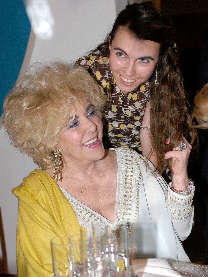 Elizabeth Taylor with her granddaughter Naomi Wilding at a private dinner held in Taylor's honor on March 18, 2003. Elizabeth Taylor and granddaughter Naomi Wilding attend a private dinner held in Taylor's honor at the Frederick R. Weisman Art Foundation in L.A. on March 18, 2003Credit: Dan Steinberg/Getty