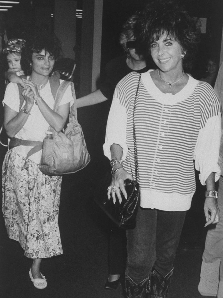 Elizabeth Taylor with her daughter Liza Todd Tivey and her grandson Quinn at LAX on August 16, 1987. Elizabeth Taylor (right) with daughter Liza Todd Tivey and grandson Quinn at LAX in L.A. on Aug. 16, 1987Credit: DMI/The LIFE Picture Collection/Shutterstock