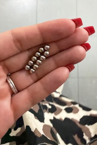 A mum claims her schoolgirl daughter was forced to undergo life-saving surgery after an Amazon magnet fidget toy she swallowed tore through TWO organs The small fidget toys caused damage to Bella's internal organsCredit: Kennedy News and Media