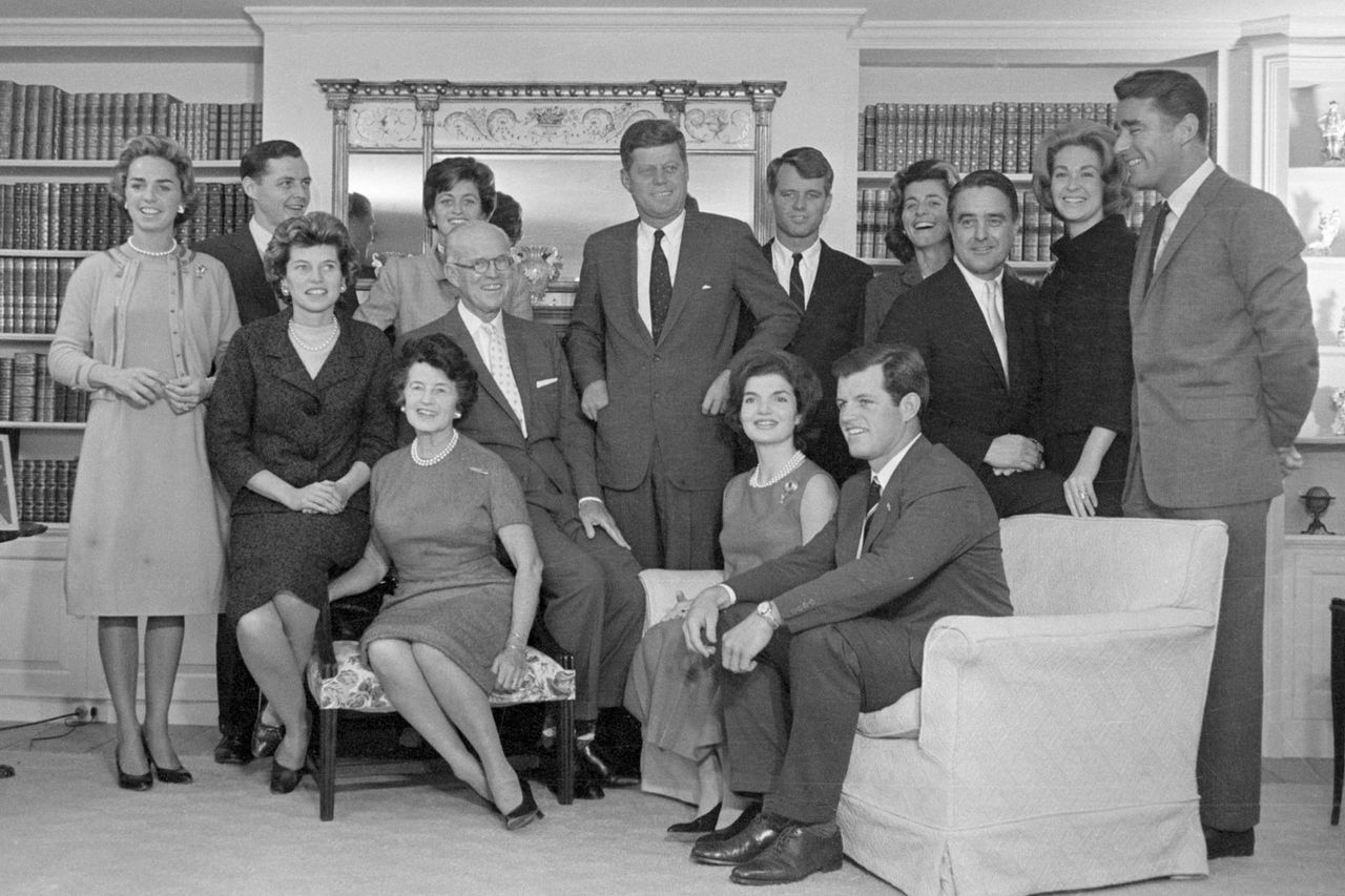 President-elect John F. Kennedy stands at the center of his large family in the living room of his father's home in Hyannisport. Standing by him are: his wife Jacqueline Kennedy; his parents, Joe and Rose Kennedy; brother Robert Kennedy and wife Ethel Ken John F. Kennedy with his familyCredit: Getty