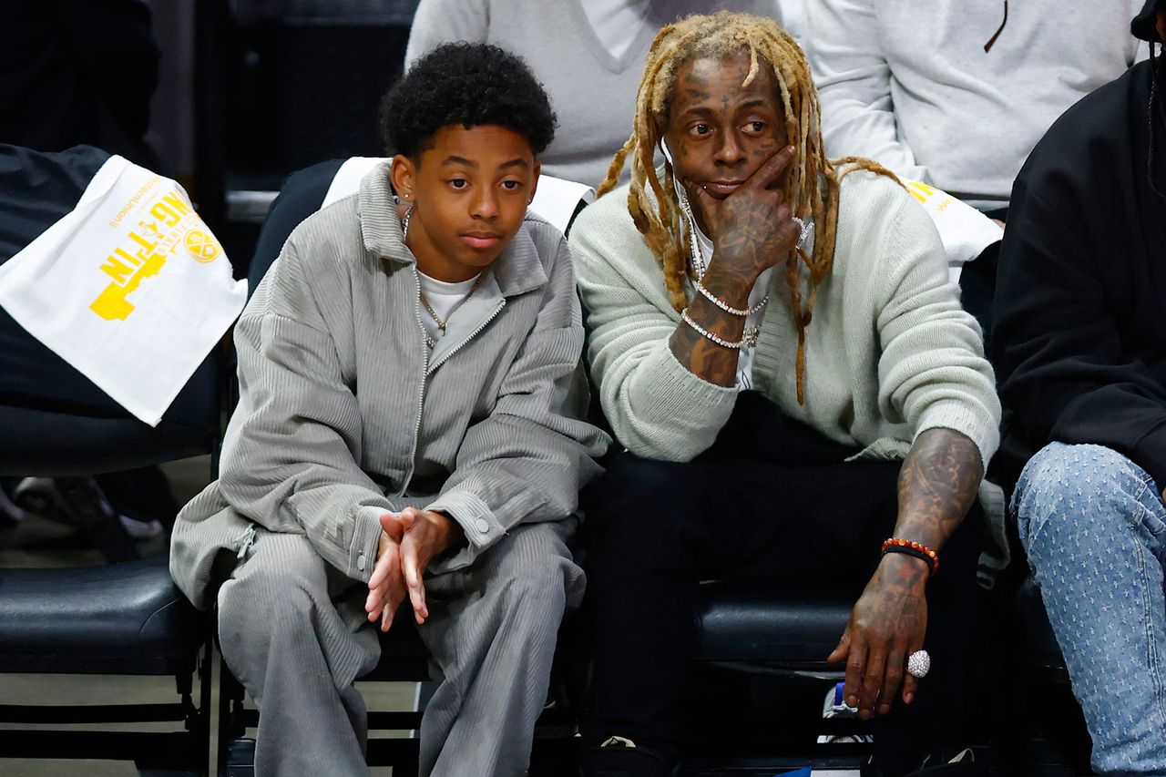 Lil Wayne Sits Courtside with Lookalike Son Kameron, 13, at NBA Finals Game 2 Lil Wayne and son KameronCredit: Justin Edmonds/Getty
