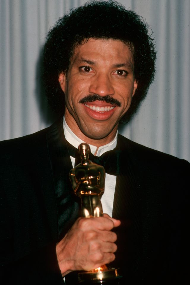 Lionel Richie poses with his Oscar for Best Original Song during the 58th Academy Awards at the Dorothy Chandler Pavilion in L.A. on March 24, 1986Credit: Ron Galella, Ltd./WireImage