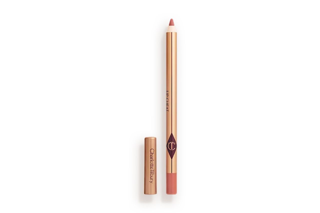 Long pencilshaped cosmetics tool with cap removed used for lip makeup Credit: Charlotte Tilbury